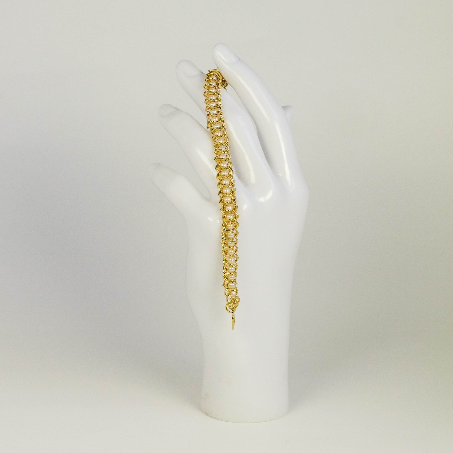 Vintage Gold Tone Vertebrae Bracelet with Caged Faux Pearls